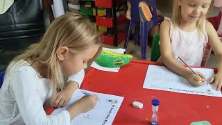 Michaela doing the Mad Minute Grade 1 Maths worksheet 1