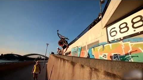 Group of People do Parkour Stunts on Jumping Stilts - 1020181