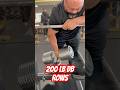 Leroy Walker pulls 200lb DUMBELLs for reps.