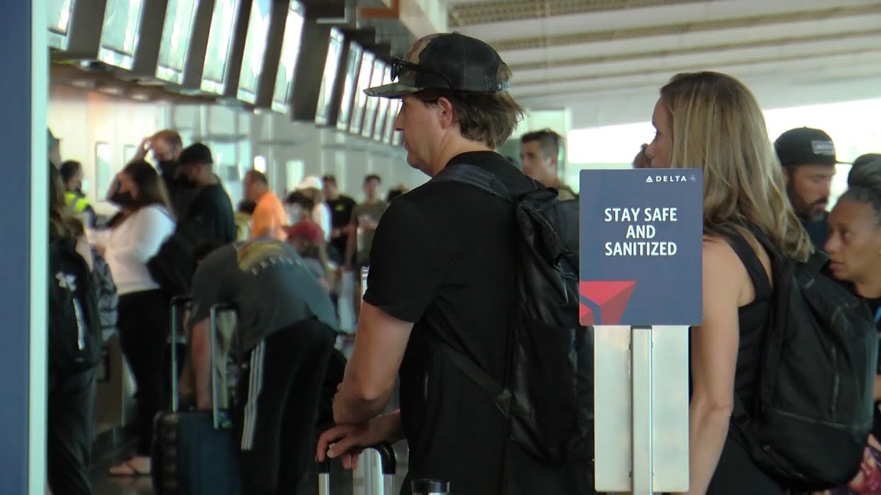 Amid scorching heat, busy Labor Day travel weekend underway - YouTube