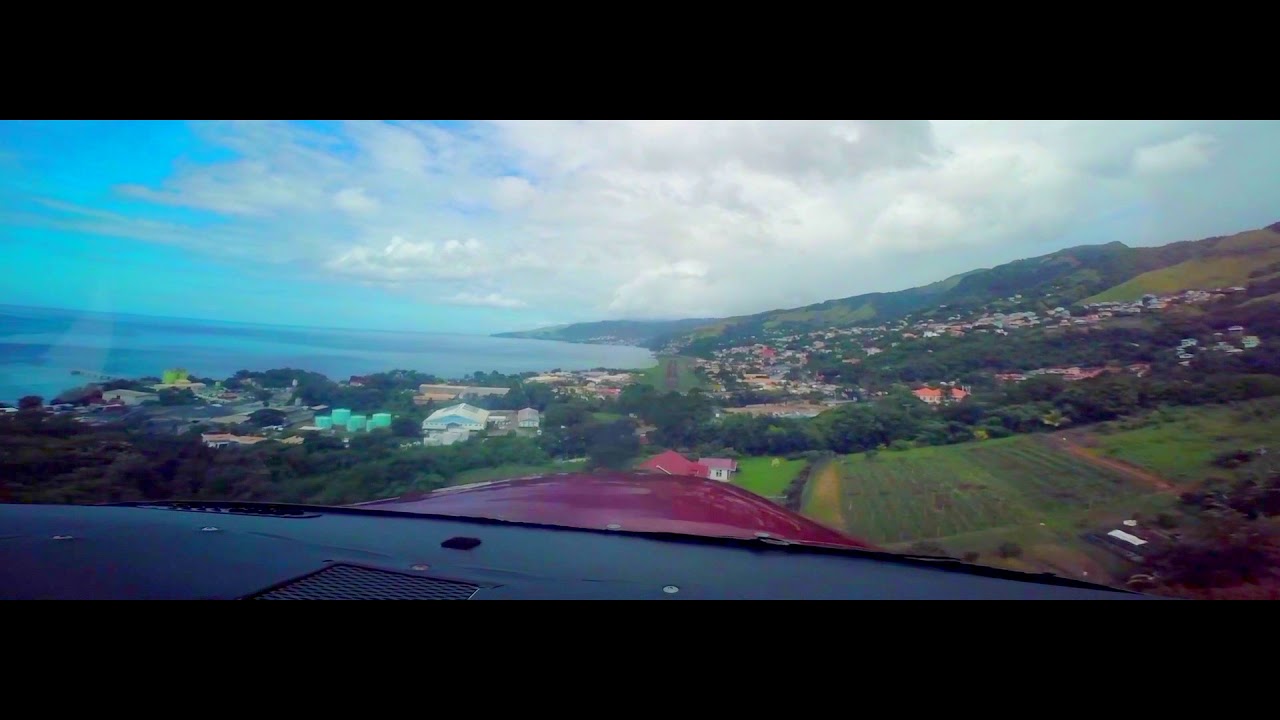 Approach and Landing at Canefield (TDCF) Airport in a Cessna 182