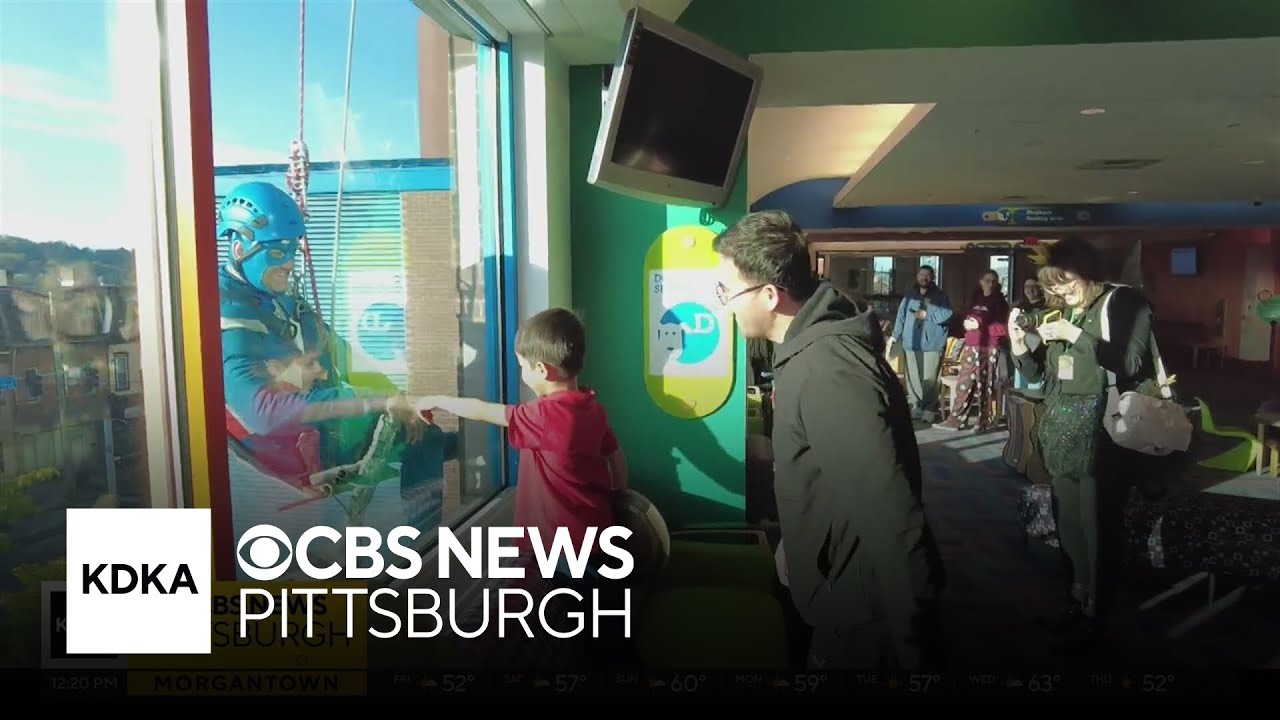 Superhero window washers return to UPMC Children's Hospital