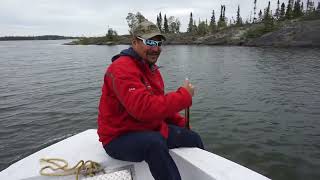 Our Dene guide, Joe the Aurora Hunter and wonderful staff exploring the Great Slave Lake on Aug 2018