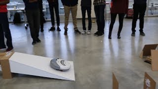 Racing Roomba takes on an obstacle course & jumps a ramp!