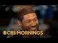 Usher shows Gayle King his custom Super Bowl ring