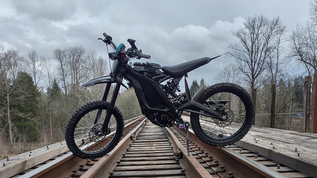 Trails Surron Riding surron ride across trestle - YouTube