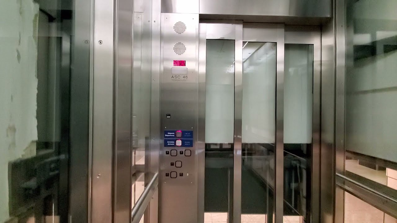 EPIC MOTOR!! Generic Hydraulic Elevators at Montreal-Trudeau International Airport - Dorval QC