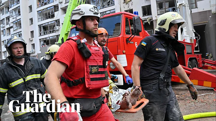 Rescuers search through rubble of buildings in Kyiv after missile strike
