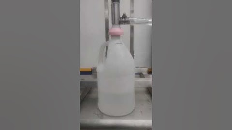 BID ON EQUIPMENT Item: 398902 - Liquid Filling Machine Single Head Overflow Filler (video 2)