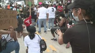 Atlanta protesters begin kneeling in protest of George Floyd's death