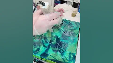 Making custom resin art piece on a 11x14 wooden ca...