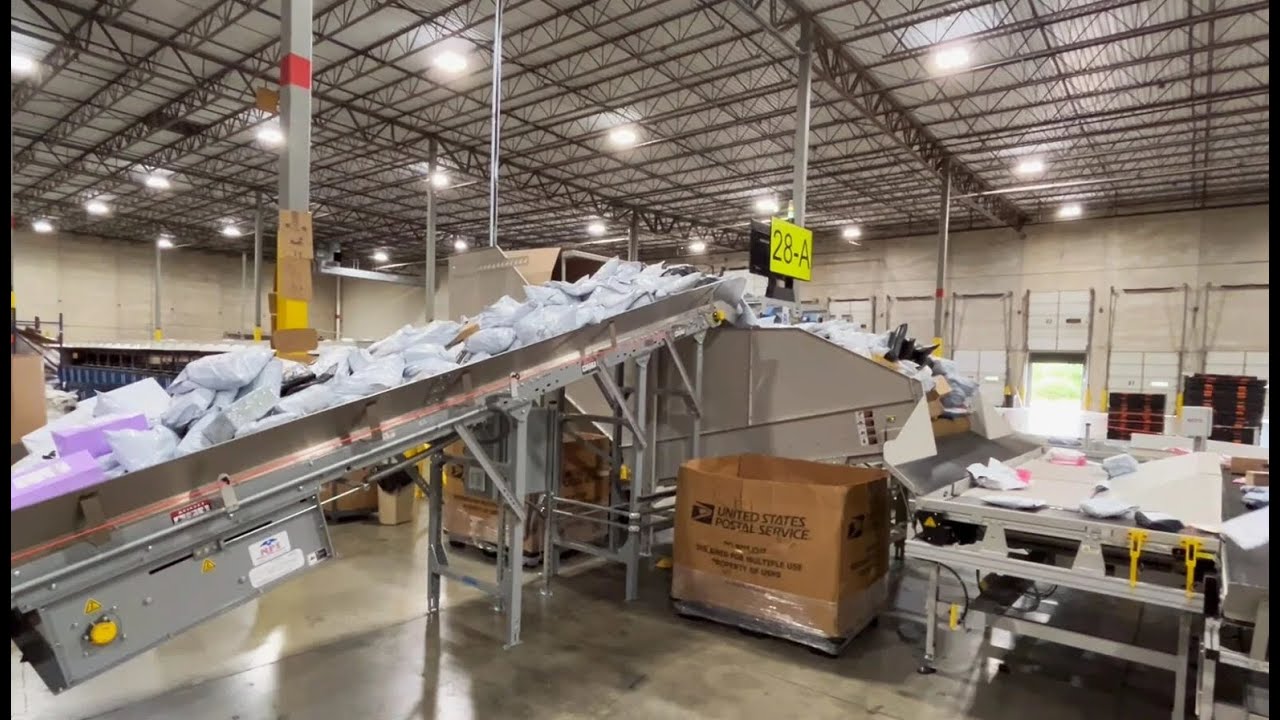 NPI Hopper Feed Conveyor - for Unpacking & Inducting Bulk Shipping ...