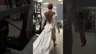 Person Trips on Wedding Dress Train in Thrift Store