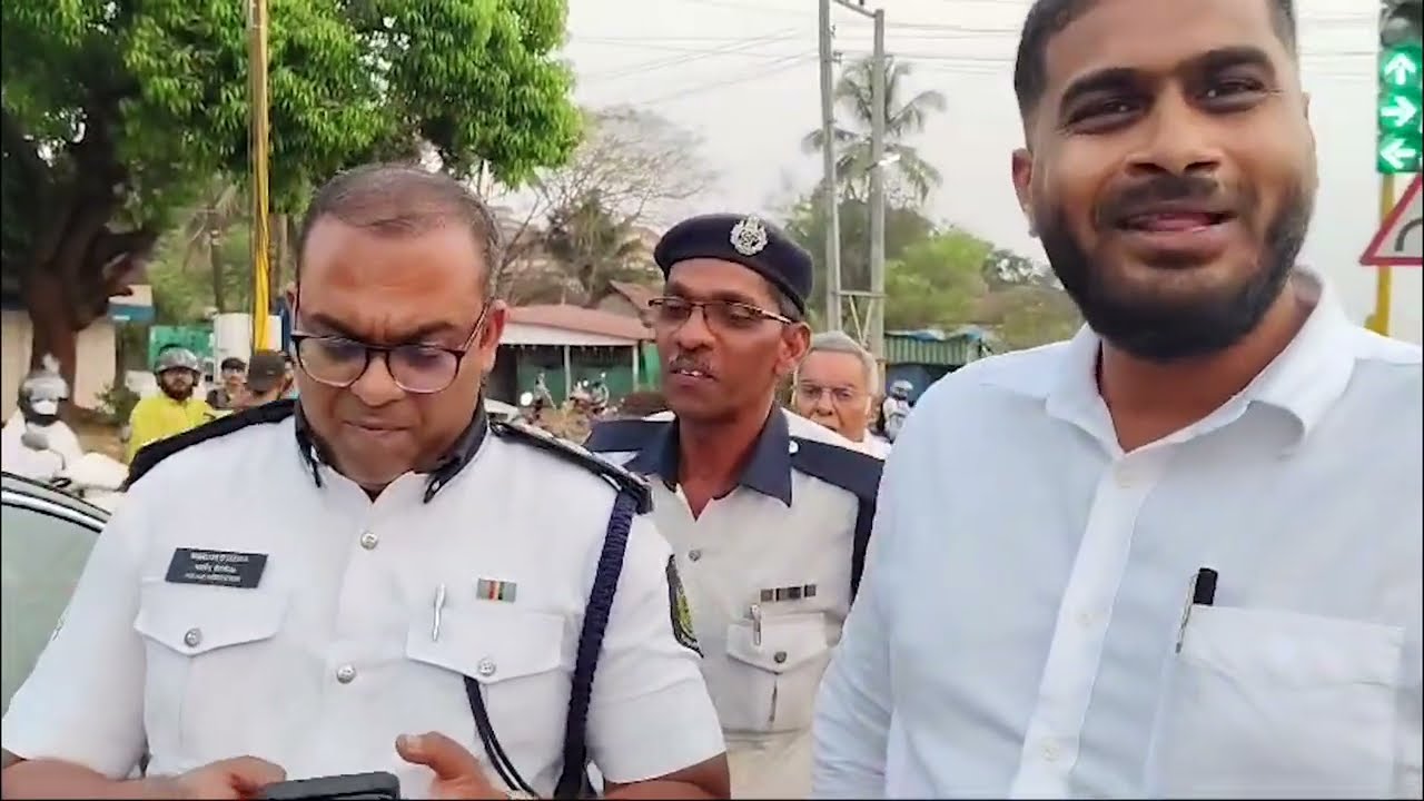 A car driver was seen in a heated argument with Mapusa Traffic Cell PI at Peddem junction