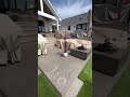 Artificial turf and exposed aggregate backyard! Fire ball fire pit too 🔥