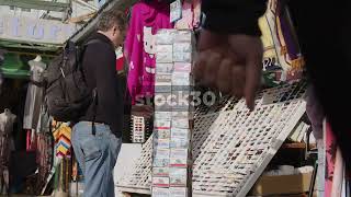 Man Browsing Fridge Magnet Souvenirs, Venice Beach, Los Angeles, California, USA