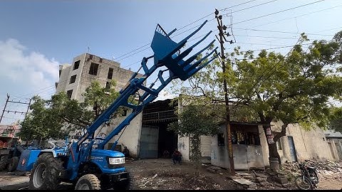 Telescopic loader mounted on tractor