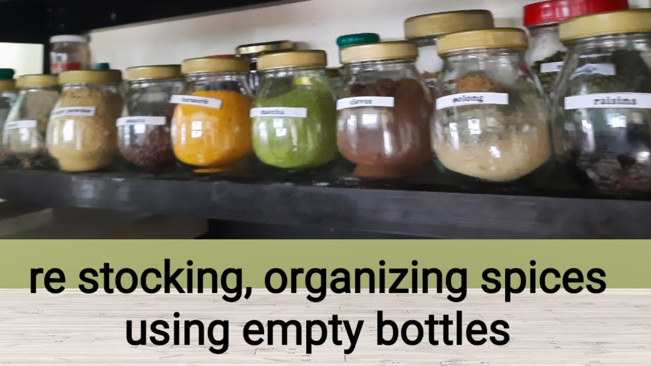 re stocking organizing herbs and spices