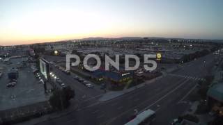 Day To Night Aerial Timelapse At Busy Intersection Near Airport