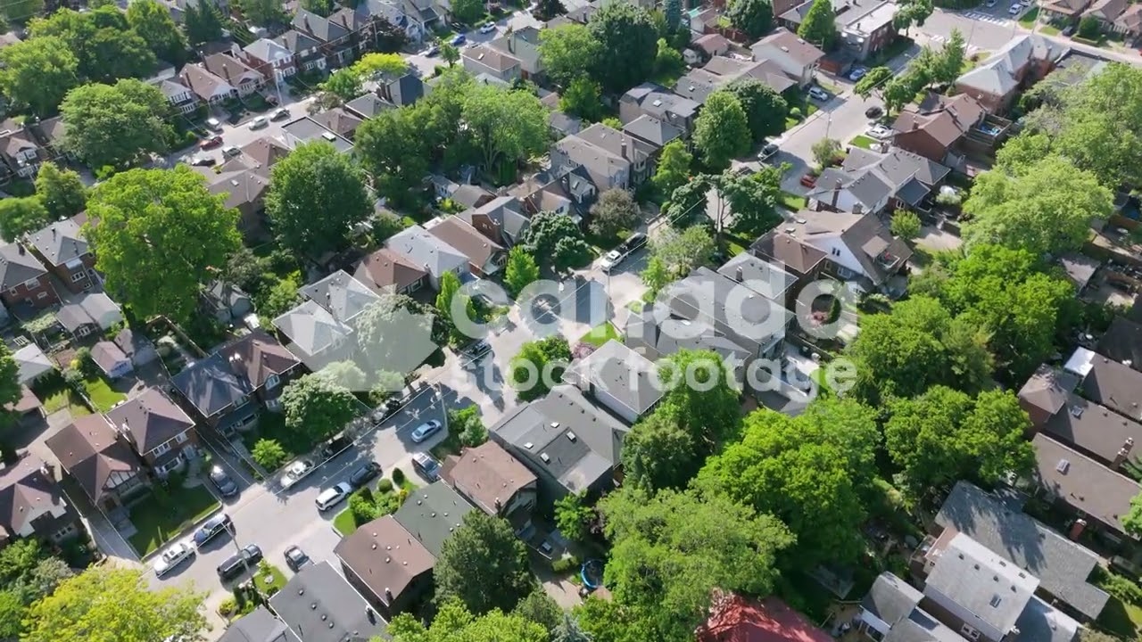Drone aerial Toronto suburb stock video. Houses in East York. Real Estate. 4K Royalty free.