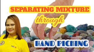 SEPARATING MIXTURE THROUGH HANDPICKING