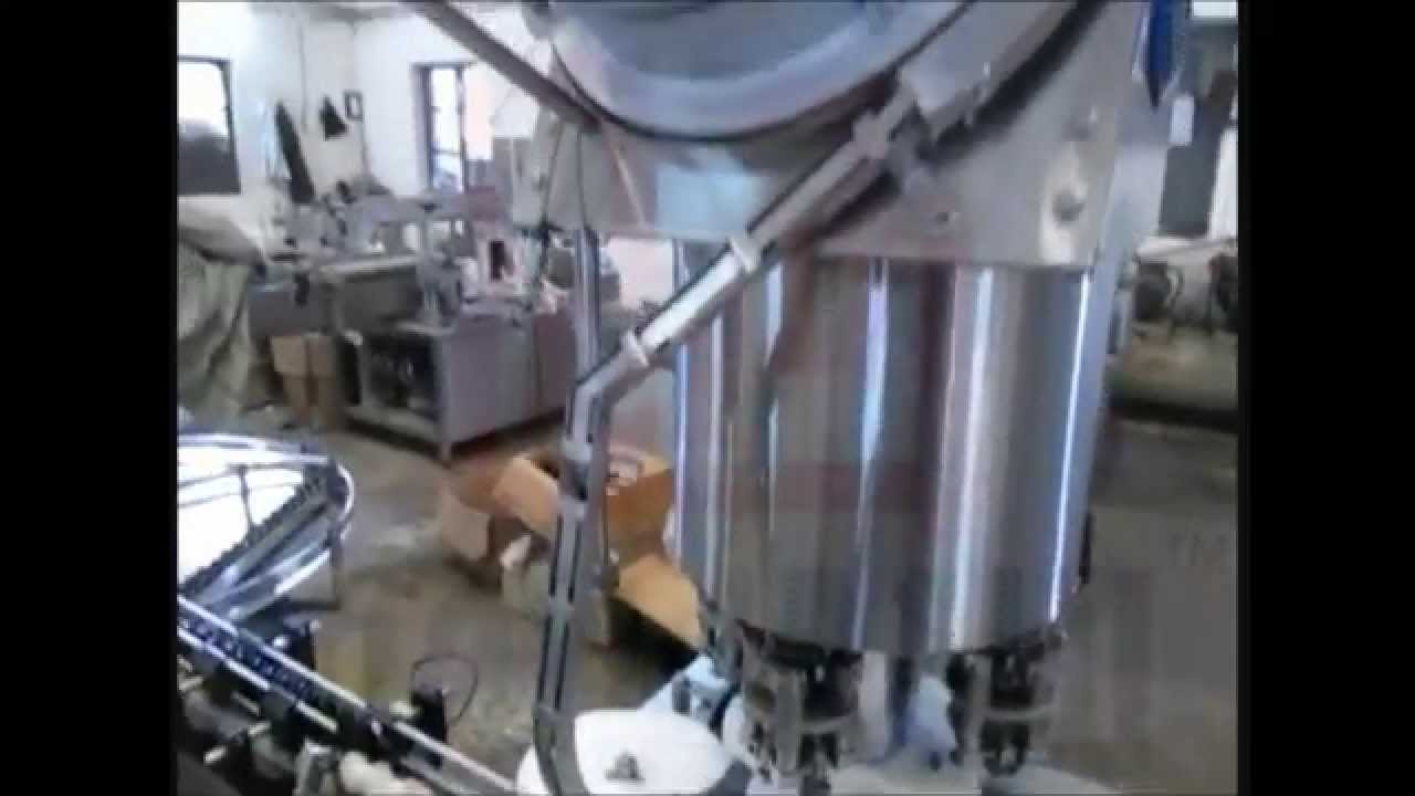 FOUR HEAD ROPP CAPPING MACHINE - YouTube