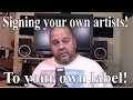 Signing your own artists, to your record label!