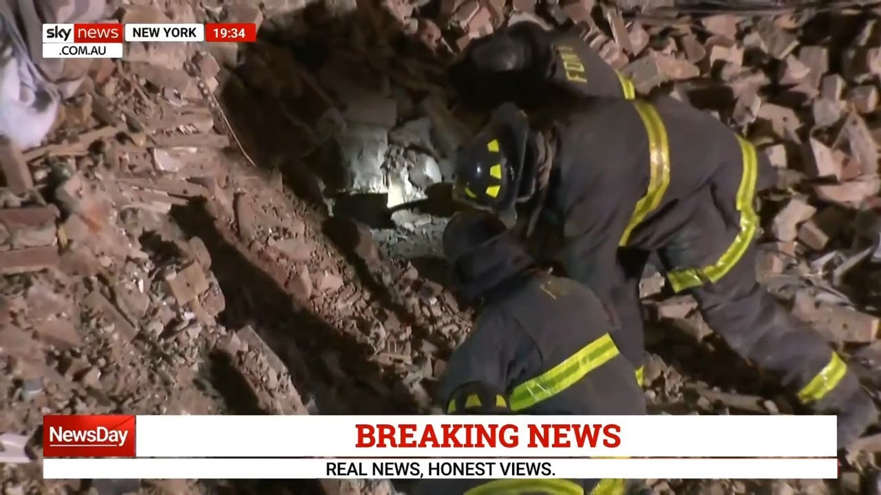 Rescue crews search through rubble after NYC building collapse - YouTube