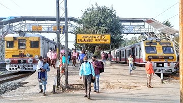 Perfect parallel train crossing colorful EMU local Barddhaman Howrah & chandanpur howrah at railgate