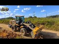 Pá Carregadeira xcmg retirando pedra/Limpeza e Patrolamento/Motoniveladoras