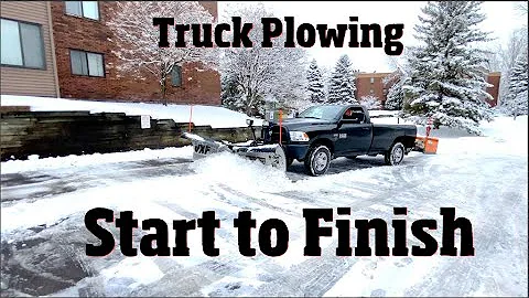 Truck snowplowing a parking lot from start to finish 4 k Video