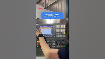How to clear alarms from the CNC controller?