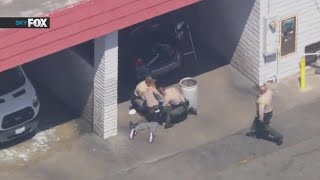 Police chase ends in 4 arrests at South LA car wash