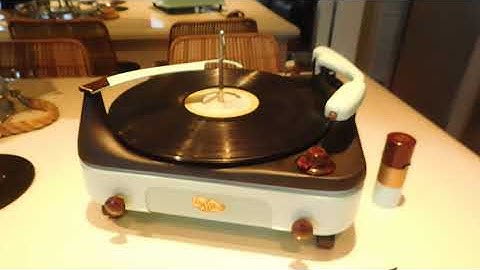 Voice of Music record player playing a couple LP records.