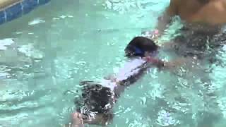 Swimming across the pool