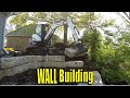 Building Stone Boulder Retaining Wall with Bobcat E35