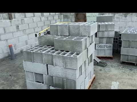 Vidéo: Maison en briques de silicate : projets, construction, avantages et inconvénients