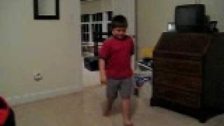 Boy Trips Over Bat Again.AVI