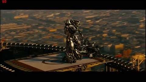 Megatron beats up Starscream (rooftop) Revenge of the Fallen.