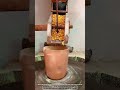 Grinding Corn Into Cornmeal With Traditional Stone Milling