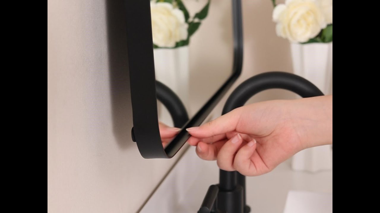 Demonstrating the 15° Adjustable Feature of Matte Black Mirror