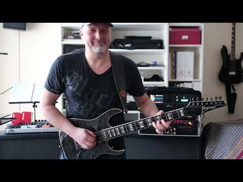 "Chop Suey Blues" by Ralf Sommerfeld featuring Brett Garsed on slide guitar.