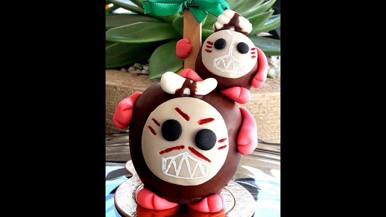 Maça de chocolate decorada com tema da Moana