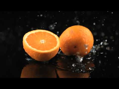 FREEDIO: "Orange splash slow motion" royalty free HD stock video footage
