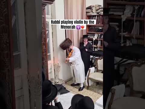 Kretchnif Rabbi playing violin by the Menorah 🕎❤️‍🔥