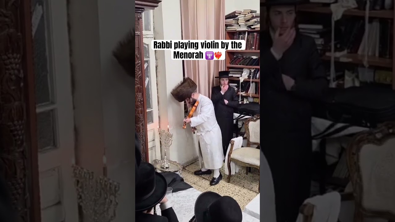 Kretchnif Rabbi playing violin by the Menorah 🕎❤️‍🔥