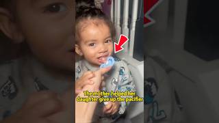 The mother helped her daughter give up the pacifier.