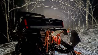 Loon photographer’s only way into remote cottage blows a track in the woods!