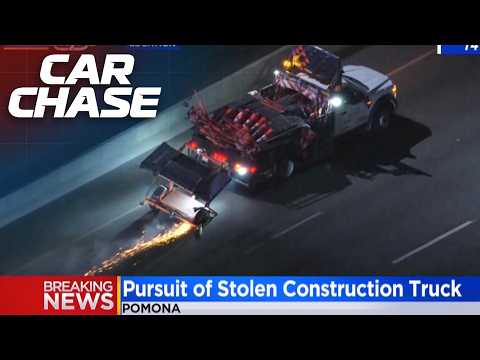 Stolen Construction Truck Spews Sparks during strange police pursuit!