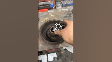 How to change rear wheel bearing ford